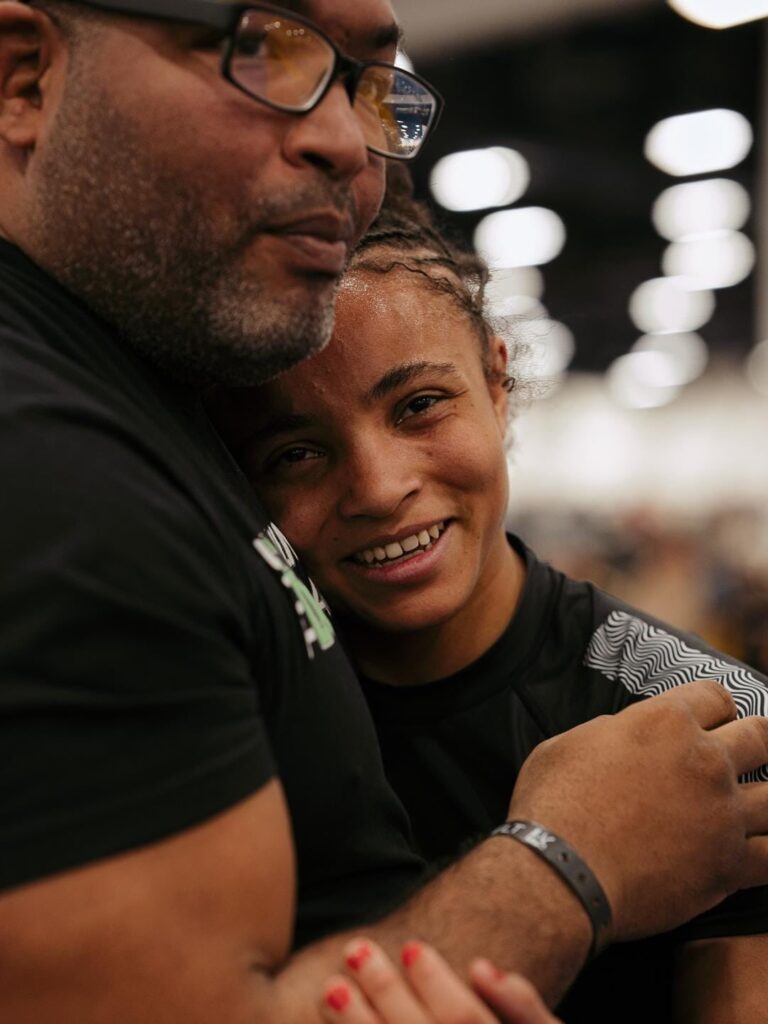 Cassia Moura conta com o apoio e orientação do mestre Bruno Bastos dentro e fora do tatame.