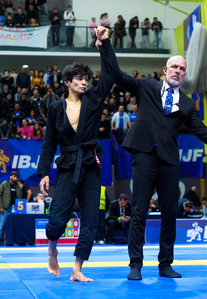 João Miyao has his hand raised in the master 1 roosterweight final at the IBJJF Europeans in Lisbon