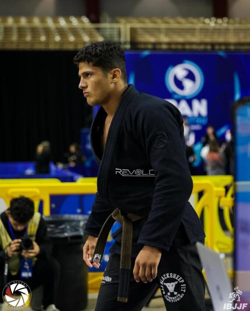 The competitor, still a brown belt, in a moment of focus before stepping onto the mat at the Pans in Florida.