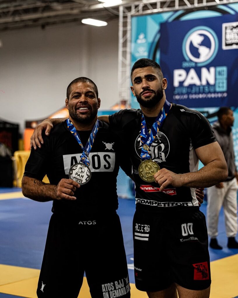 André Galvão poses with his student Natã Tenca after the IBJJF Pan No Gi. Photo: Handout